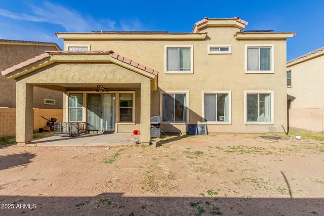 a view of white house with a outdoor space