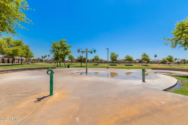 a view of a lake with a yard