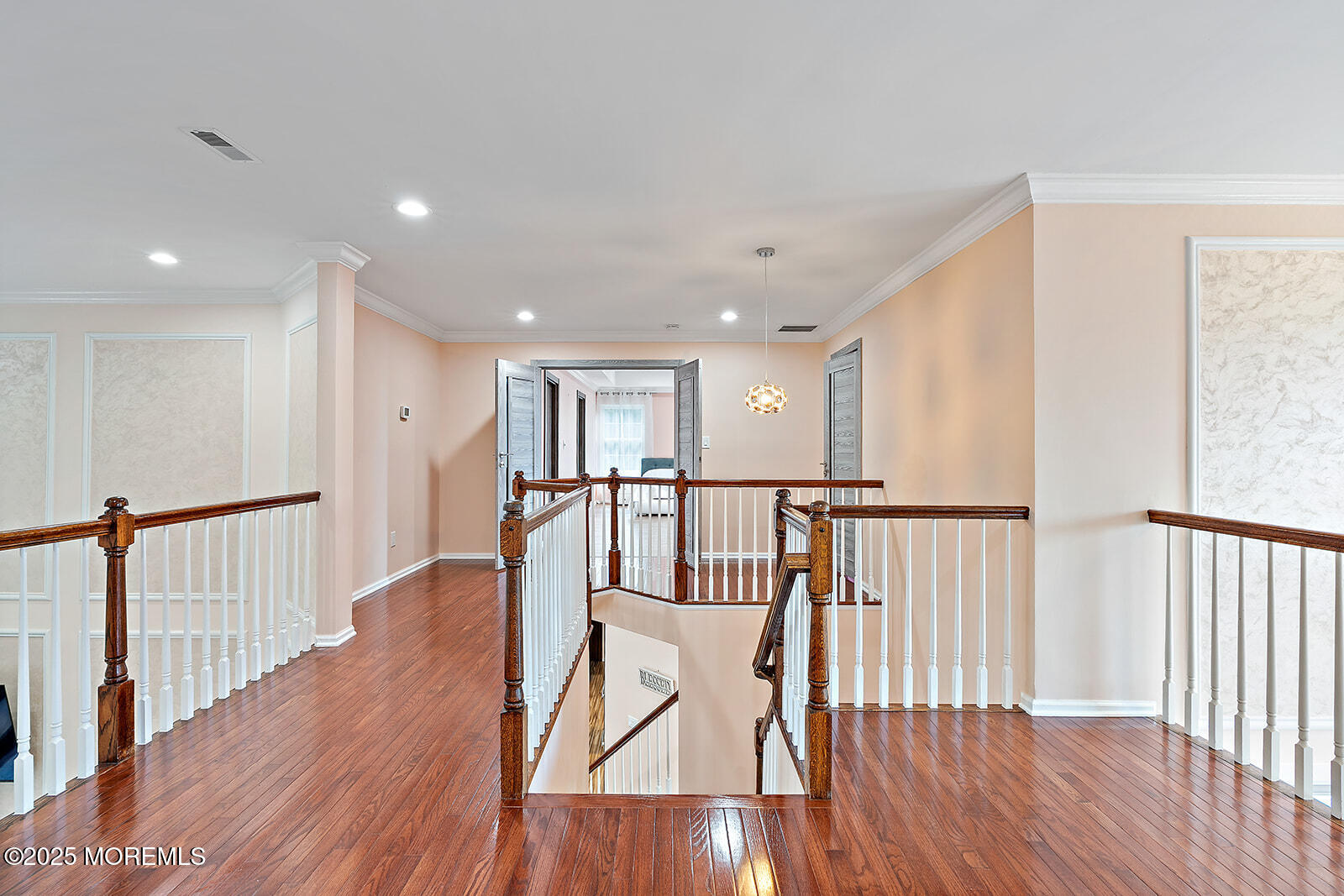 26 Chiswick Court Jackson, NJ 08527 - Photo 18 of 41 a view of a hallway with wooden floor and windows