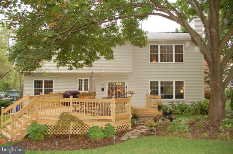3648 Valley Road Ellicott City, MD 21042 - Photo 2 of 30 a front view of a house with a yard