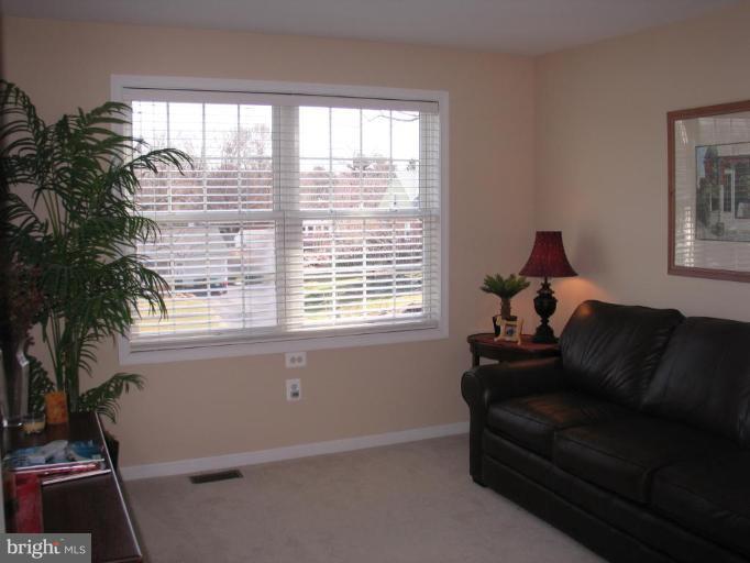 3648 Valley Road Ellicott City, MD 21042 - Photo 18 of 30 a living room with furniture and a large window