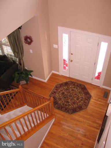 3648 Valley Road Ellicott City, MD 21042 - Photo 23 of 30 a bedroom with a bed and a window
