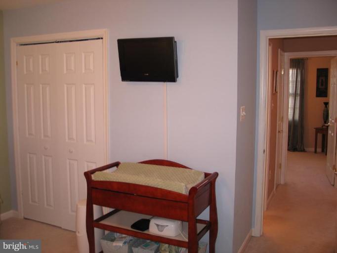 3648 Valley Road Ellicott City, MD 21042 - Photo 26 of 30 a view of a room with a table and chairs
