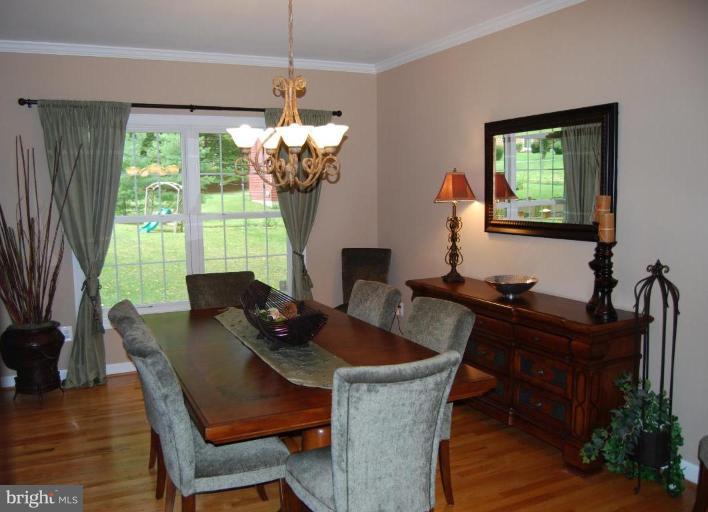 3648 Valley Road Ellicott City, MD 21042 - Photo 30 of 30 a view of a dining room with furniture window and outside view