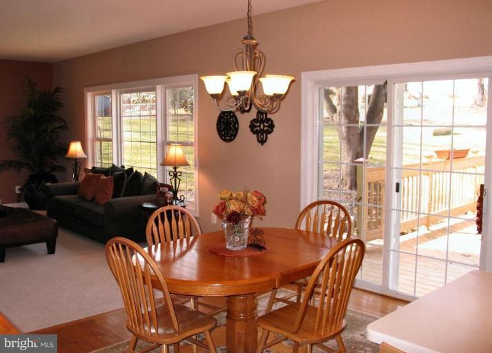 3648 Valley Road Ellicott City, MD 21042 - Photo 8 of 30 a view of a dining room with furniture window and outside view