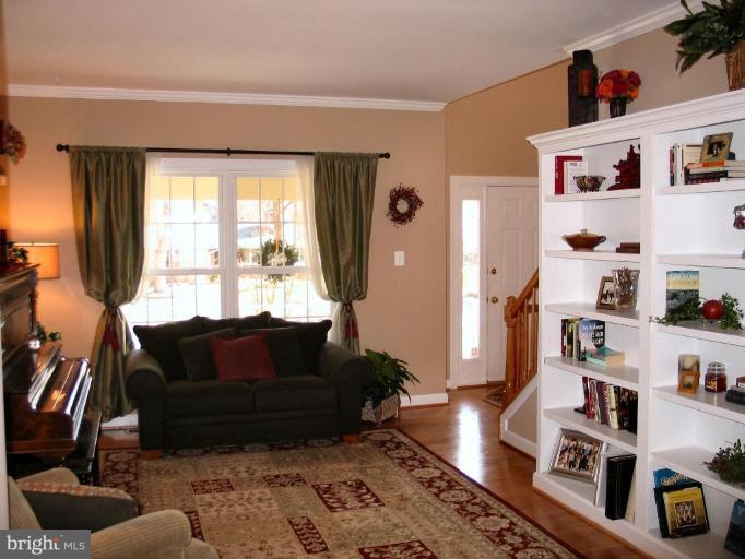 3648 Valley Road Ellicott City, MD 21042 - Photo 10 of 30 a living room with furniture cabinets and a window
