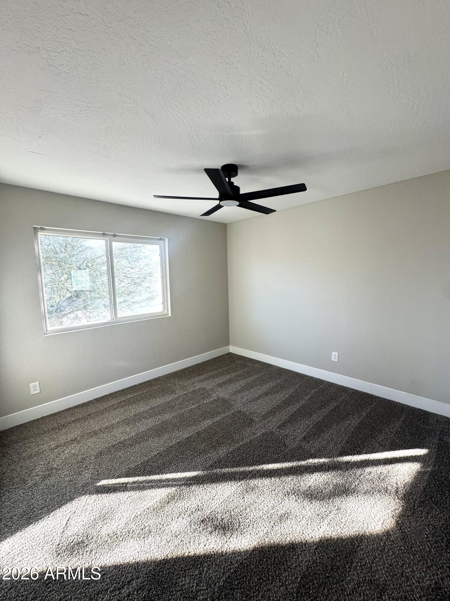 2003 North 51st Way Phoenix, AZ 85008 - Photo 16 of 22 a view of an empty room and window