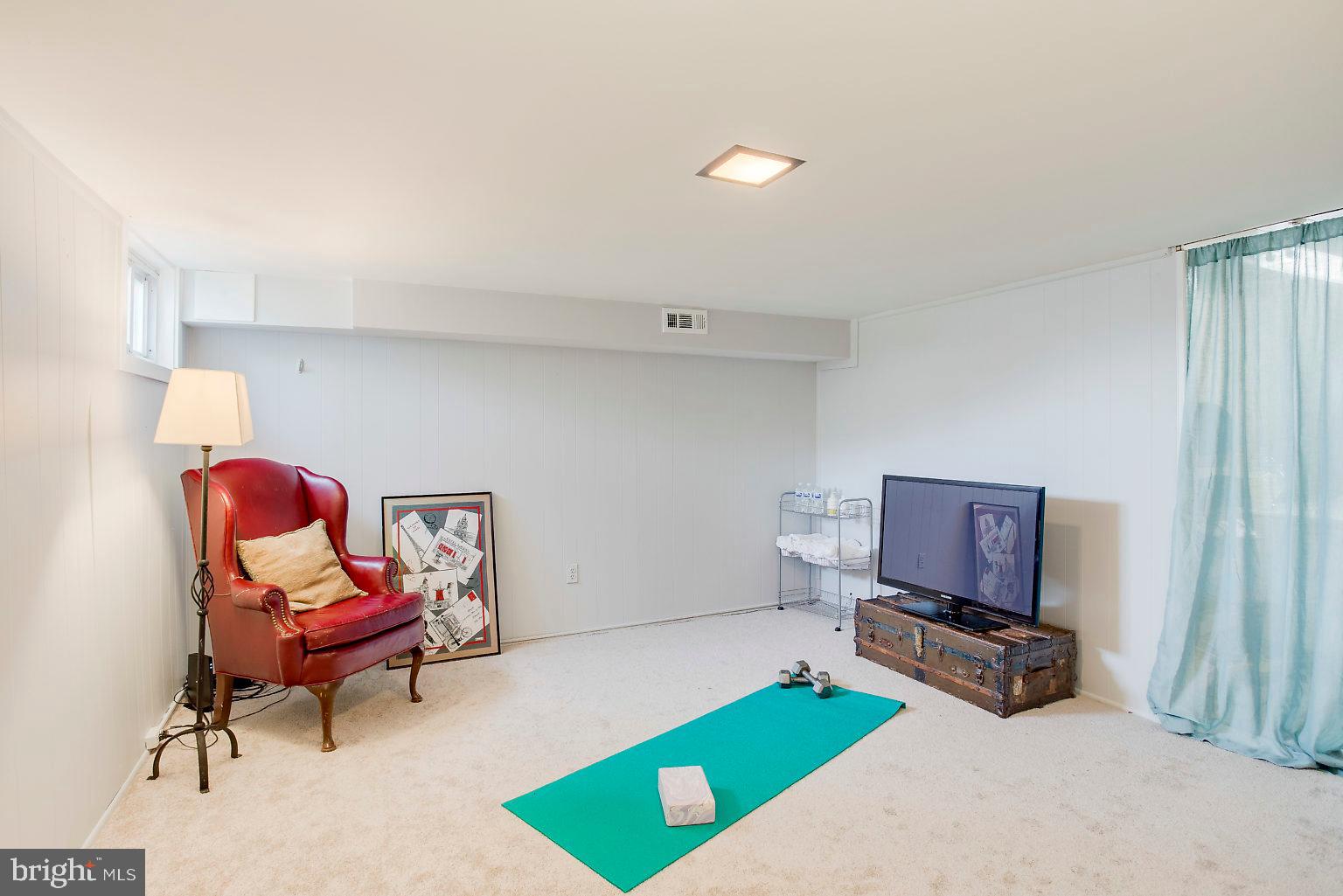 1131 Elm Road Baltimore, MD 21227 - Photo 25 of 32 Finished lower level with brand new carpet