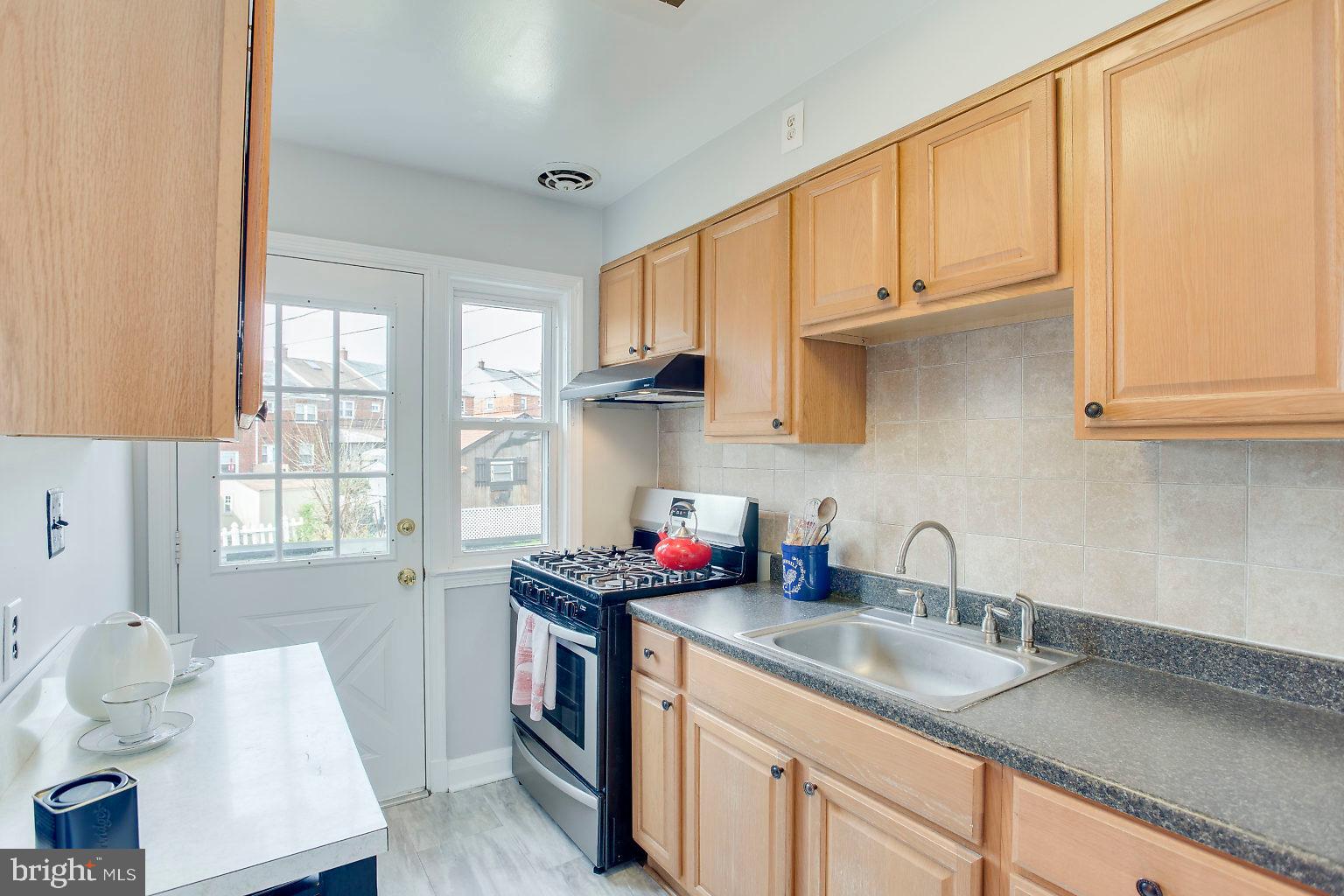 1131 Elm Road Baltimore, MD 21227 - Photo 4 of 32 New stainless steel stove