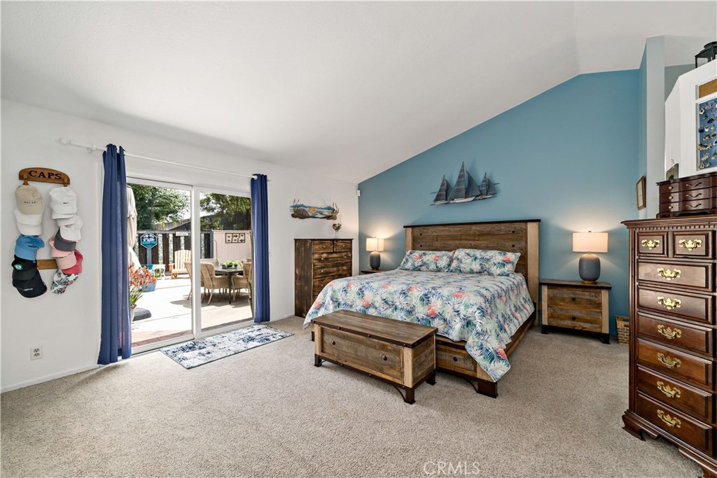 31141 Vía Gilberto Temecula, CA 92592 - Photo 18 of 39 a bedroom with a bed and walk in closet with living room