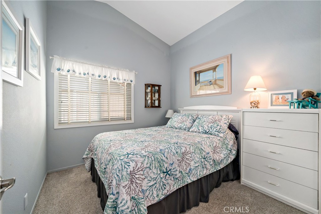 31141 Vía Gilberto Temecula, CA 92592 - Photo 28 of 39 a bedroom with a bed and a window