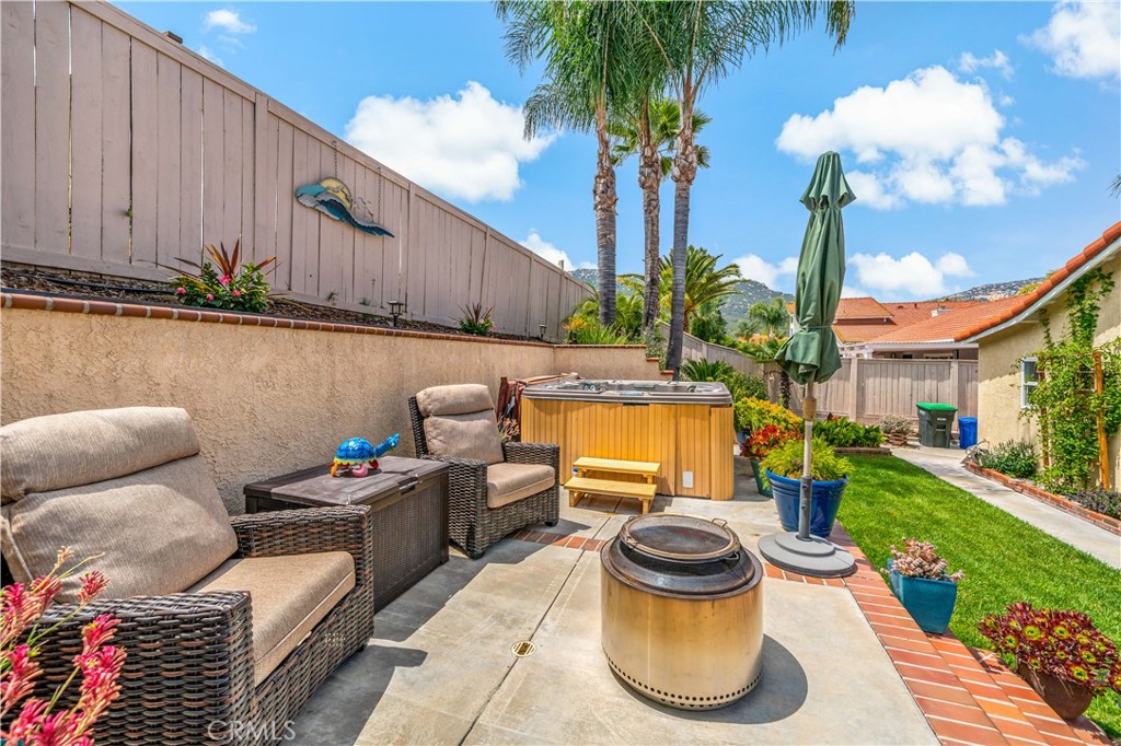 31141 Vía Gilberto Temecula, CA 92592 - Photo 31 of 39 a backyard of a house with seating space