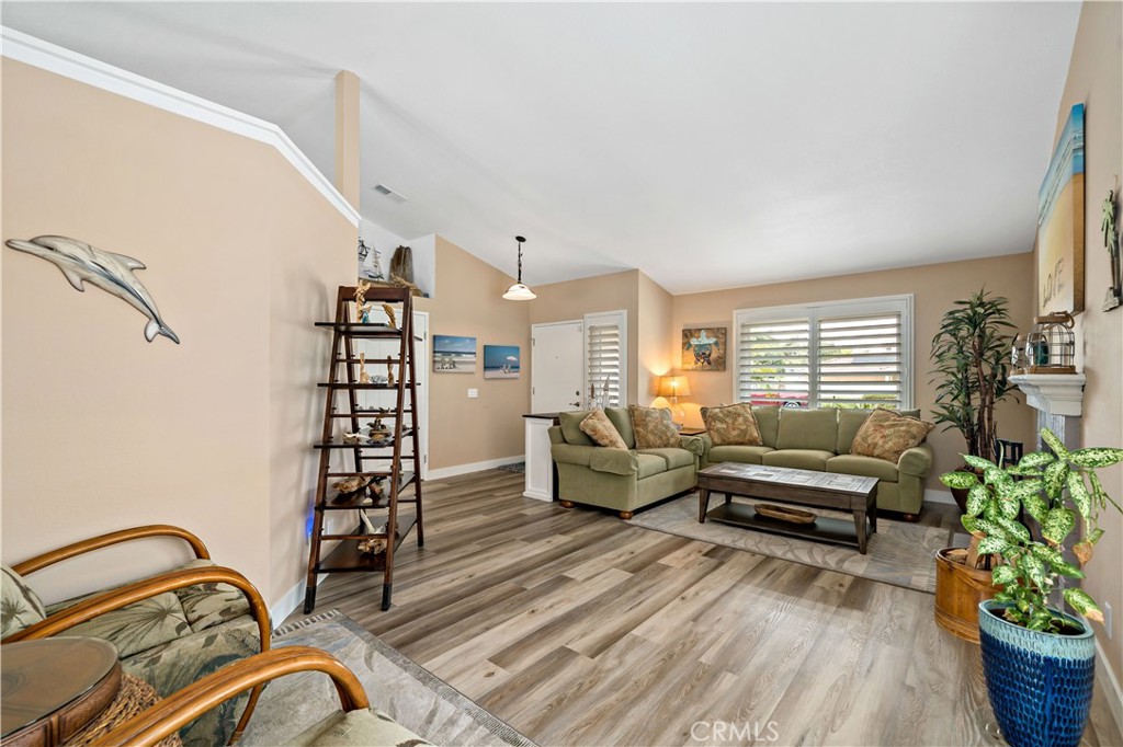 31141 Vía Gilberto Temecula, CA 92592 - Photo 8 of 39 a living room with furniture and flowers
