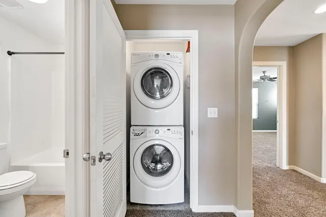 a bathroom with a sink a toilet and bathtub