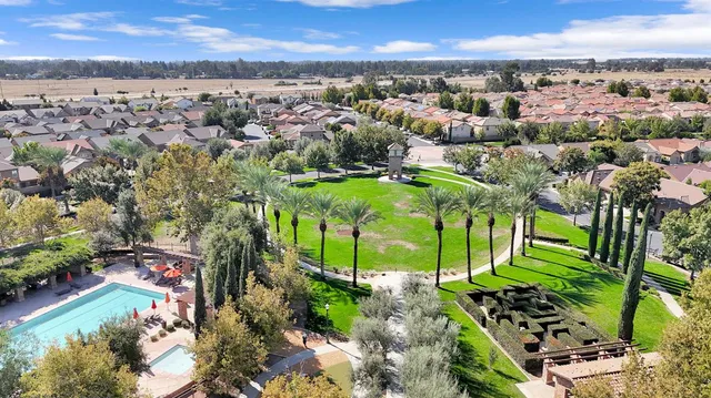 an aerial view of a house with a ocean view