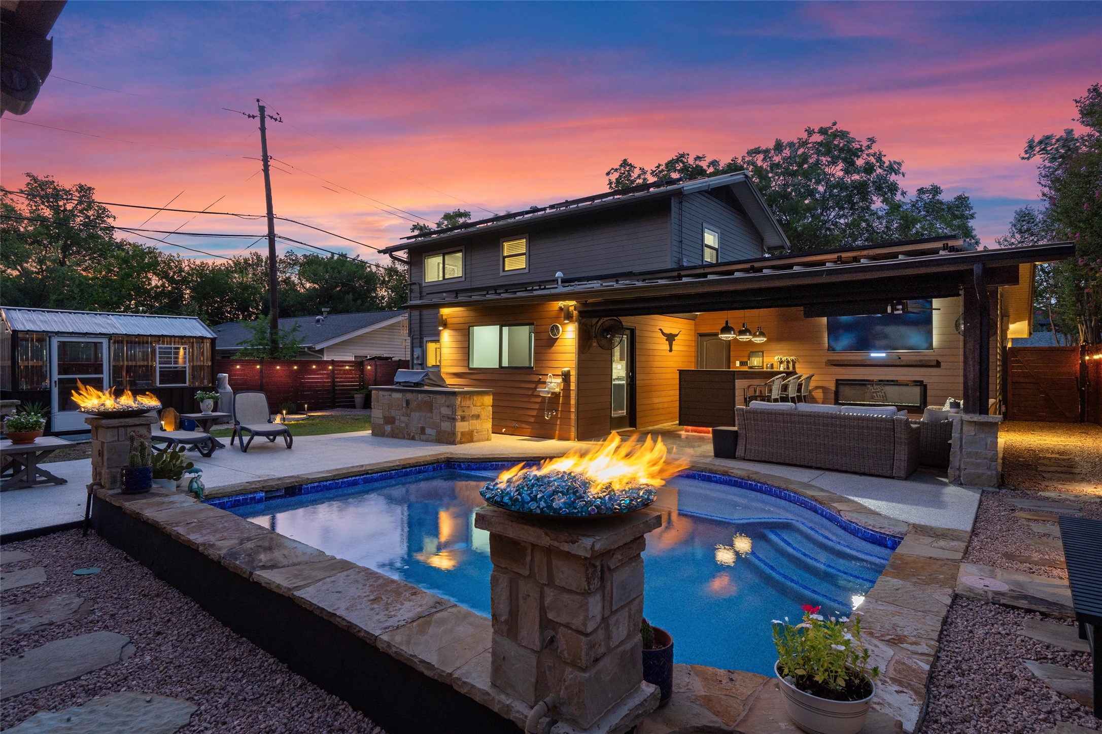a view of a patio with couches chairs and a potted plant