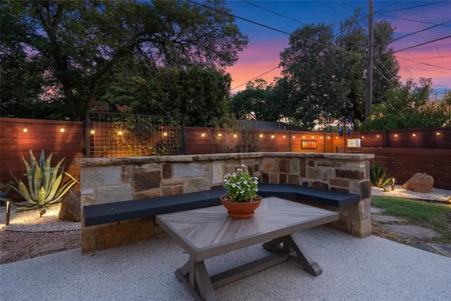 a view of a chairs and tables in the patio