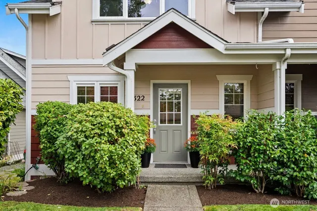 front view of a house with a yard