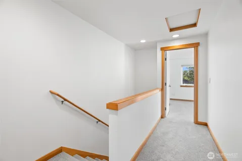 a view of hallway with stairs