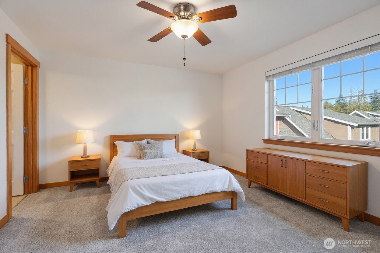 1322 Polly's Lane Bainbridge Island, WA 98110 - Photo 13 of 21 a bedroom with a bed and window