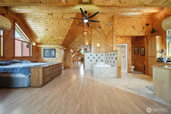 a living room with stainless steel appliances kitchen island granite countertop furniture and a kitchen view