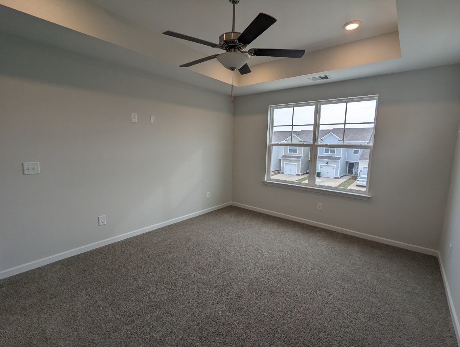 504 Gilroy Court Antioch, TN 37013 - Photo 16 of 17 an empty room with windows and ceiling fan