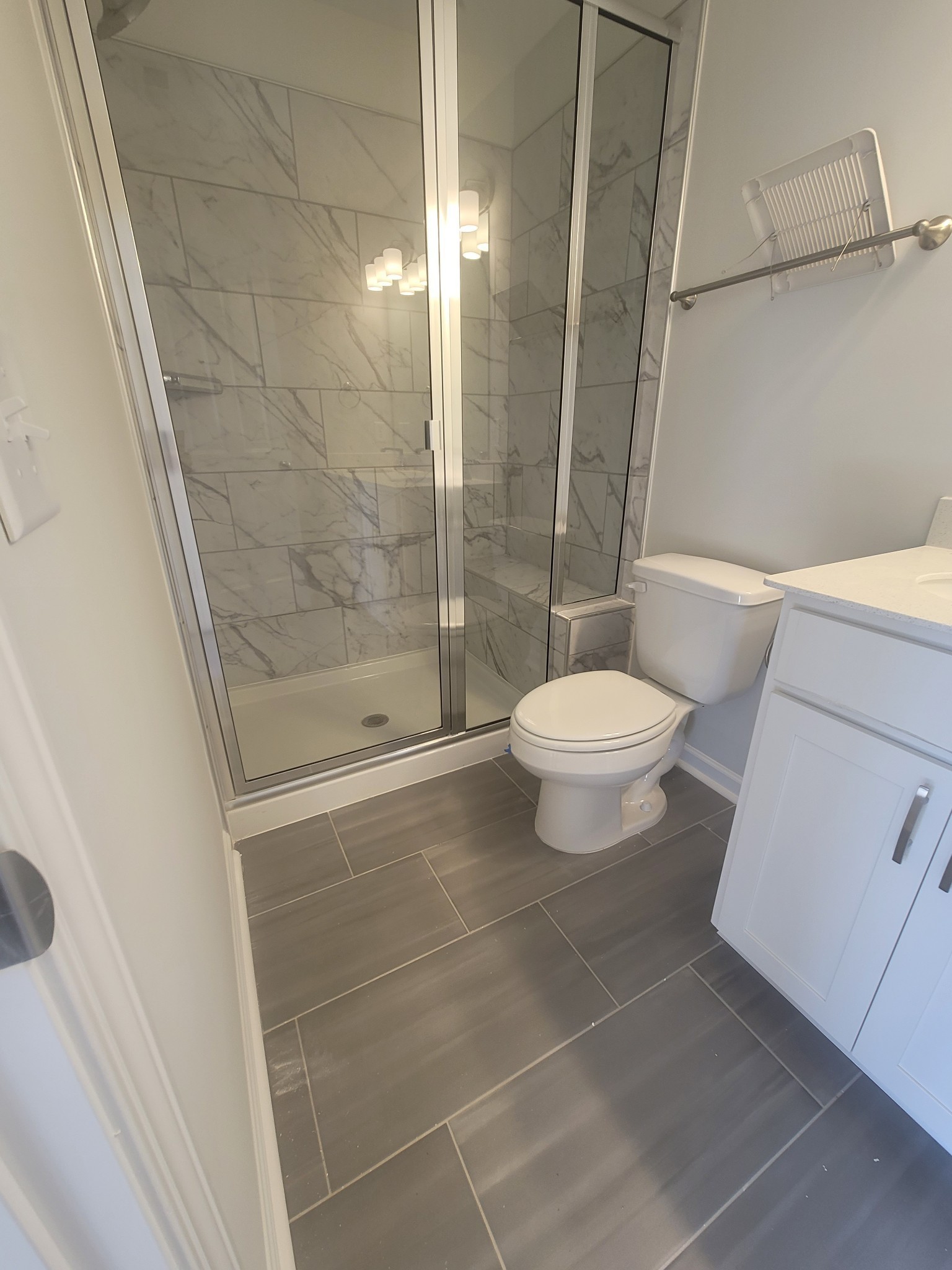 504 Gilroy Court Antioch, TN 37013 - Photo 8 of 17 a bathroom with a toilet and a shower