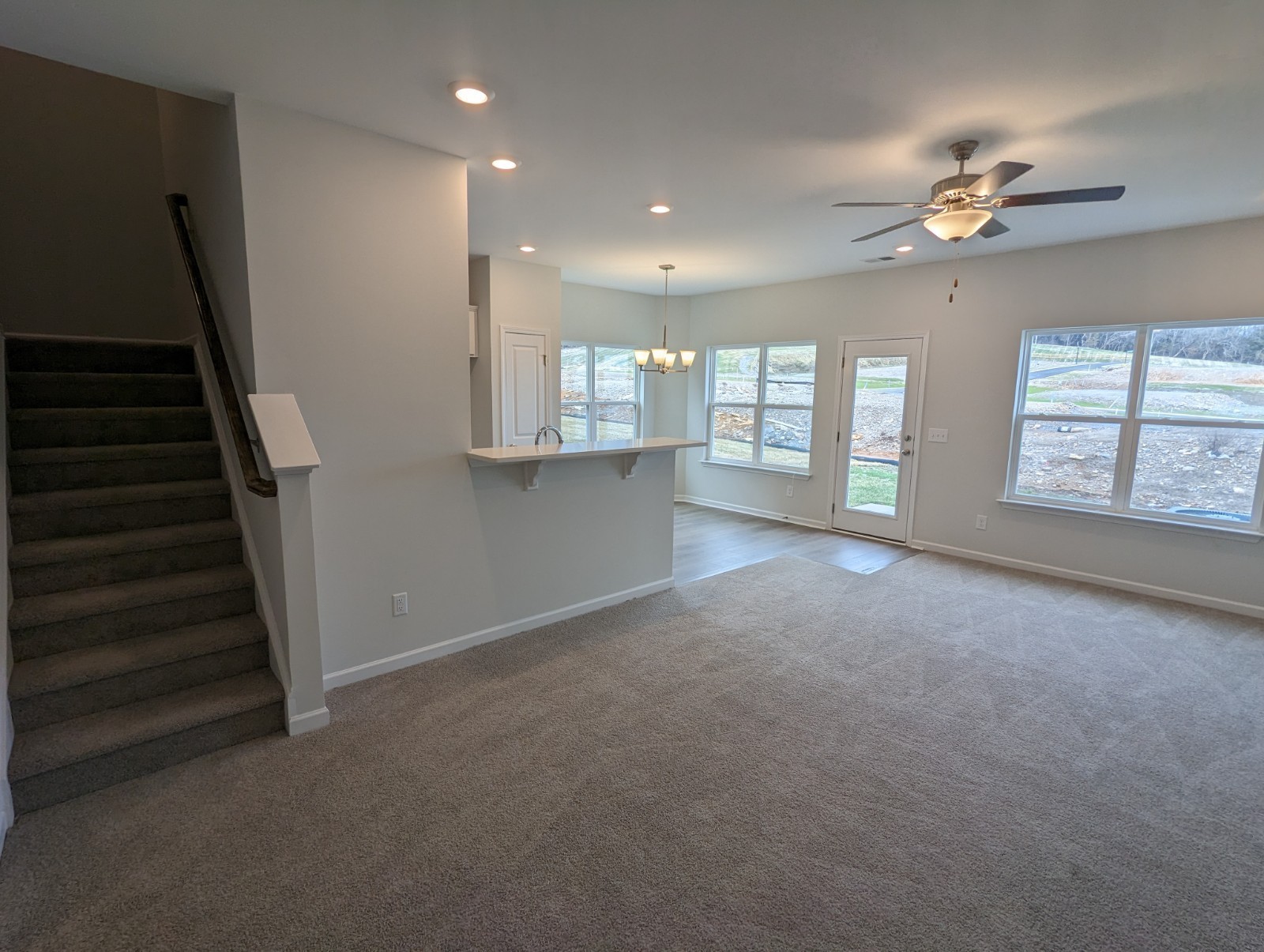 504 Gilroy Court Antioch, TN 37013 - Photo 10 of 17 a view of an empty room with a window and fireplace