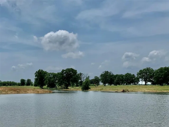 a view of lake and yard