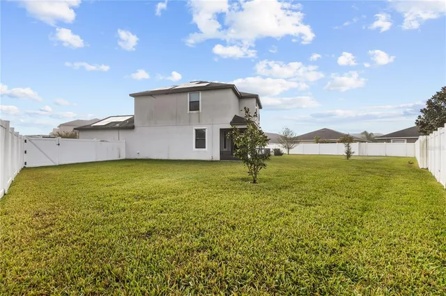 a view of a big room with table and chair