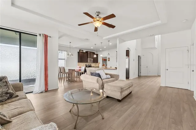 a living room with furniture white walls and white walls
