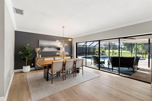 a bedroom with furniture and a ceiling fan