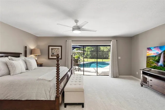 a kitchen with stainless steel appliances kitchen island granite countertop a sink and cabinets