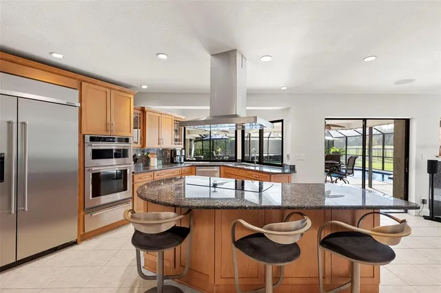 a bathroom with a sink toilet and mirror