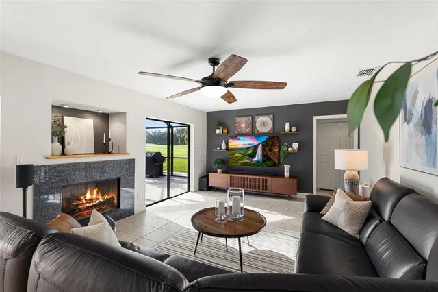 a view of a swimming pool with sitting area