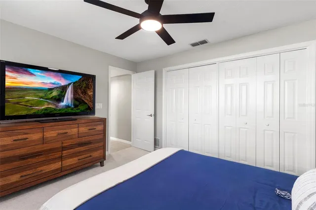 a view of outdoor space with signage and flags