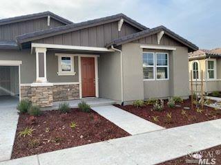 5855 Kittyhawk Place Rohnert Park, CA 94928 - Photo 1 of 1 a front view of a house with garden