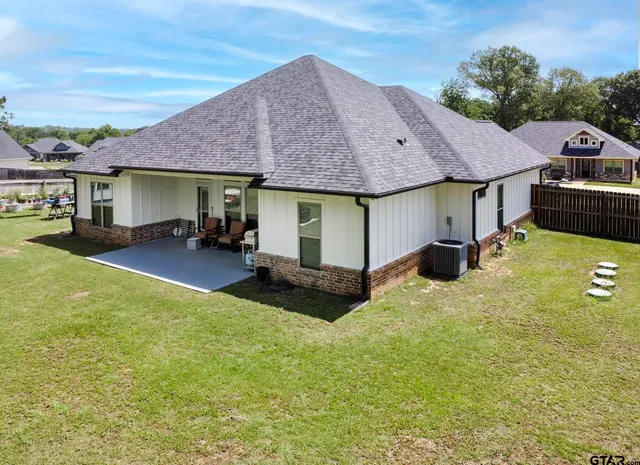 a view of a house with a patio