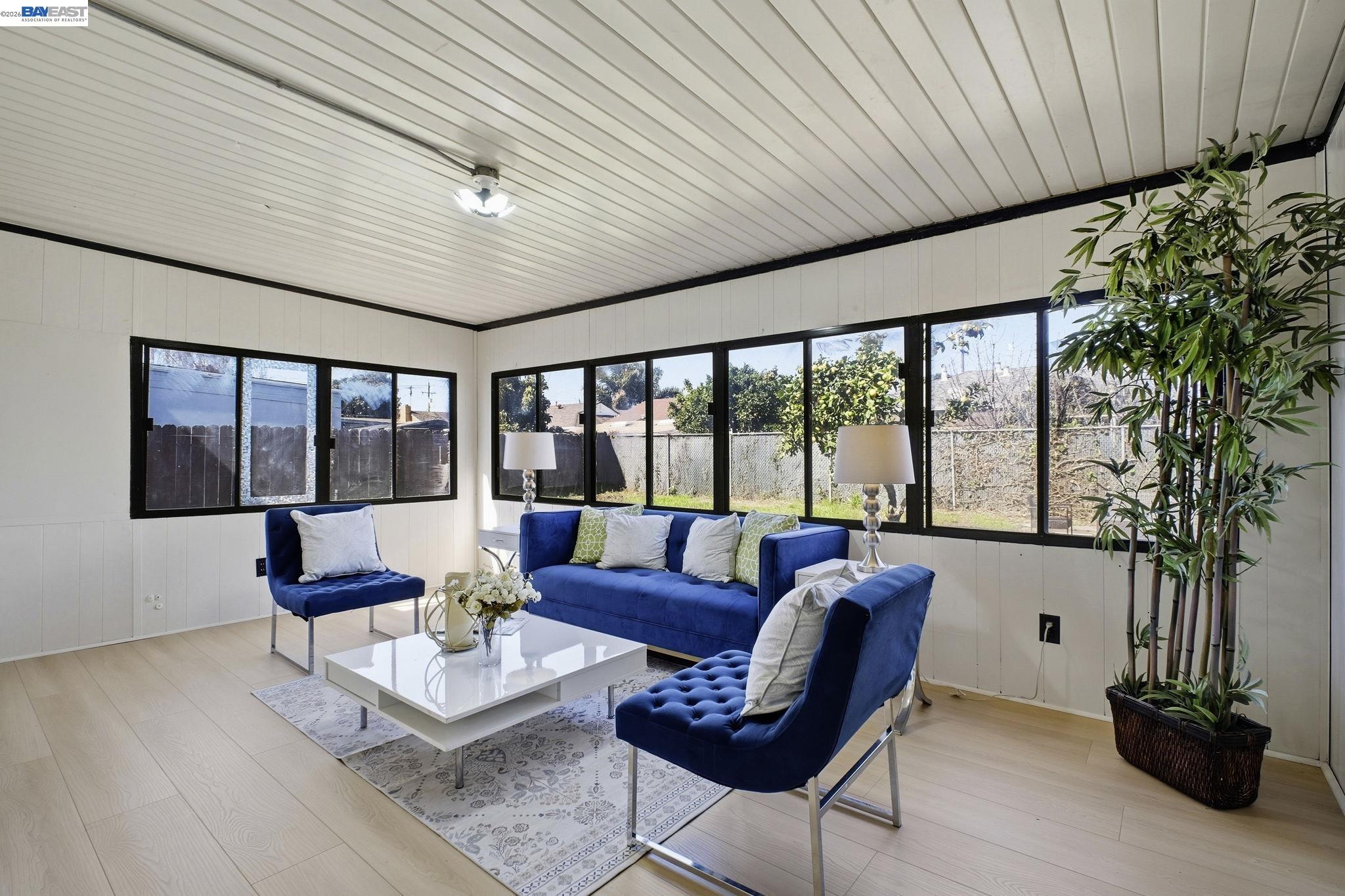 937 Neil Way Hayward, CA 94545 - Photo 12 of 37 a living room with furniture and a large window