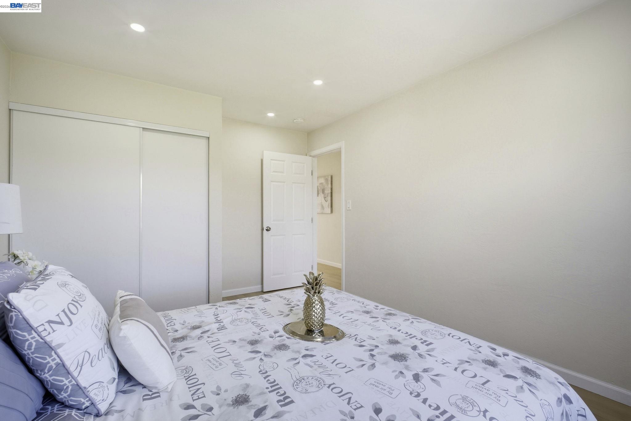 937 Neil Way Hayward, CA 94545 - Photo 25 of 37 a bedroom with a bed and a window