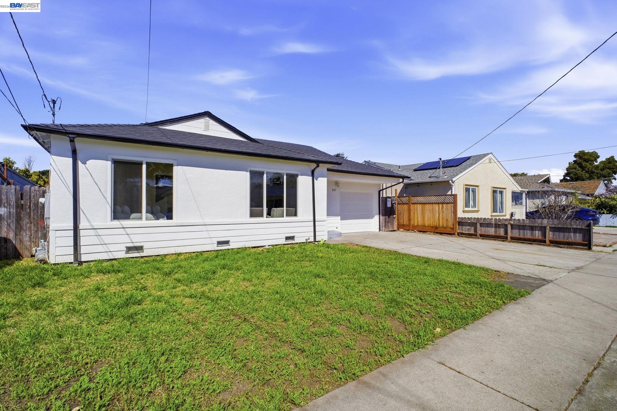 937 Neil Way Hayward, CA 94545 - Photo 3 of 37 a front view of a house with yard