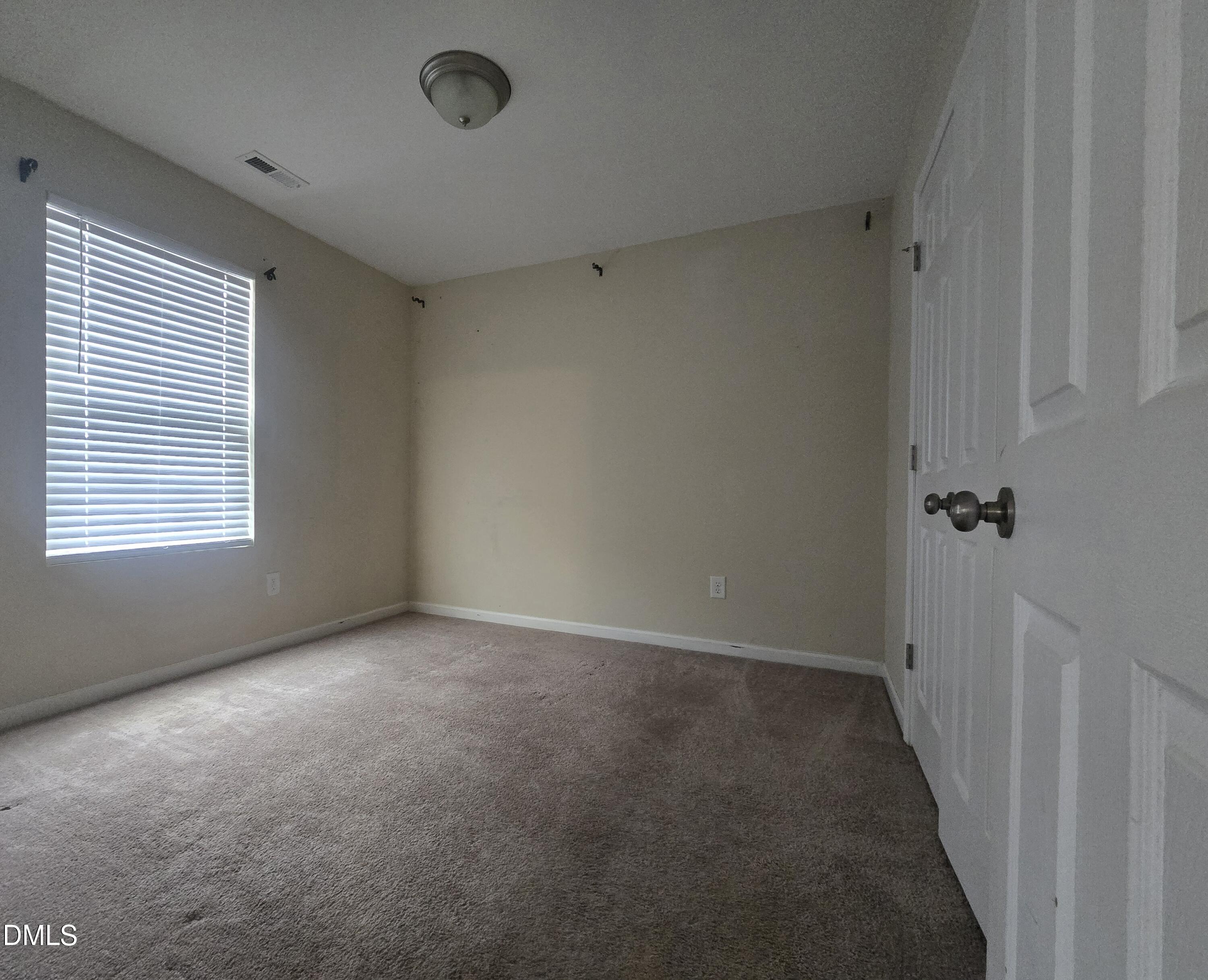 202 Mason Road Durham, NC 27712 - Photo 11 of 15 a view of a room with a window