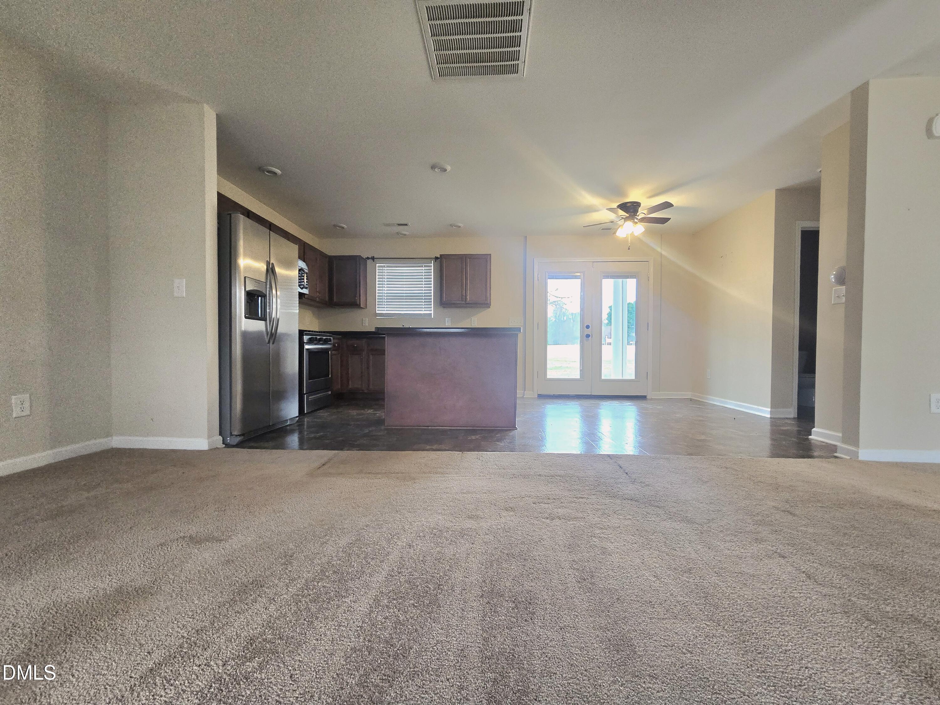 202 Mason Road Durham, NC 27712 - Photo 4 of 15 a view of an empty room with a window