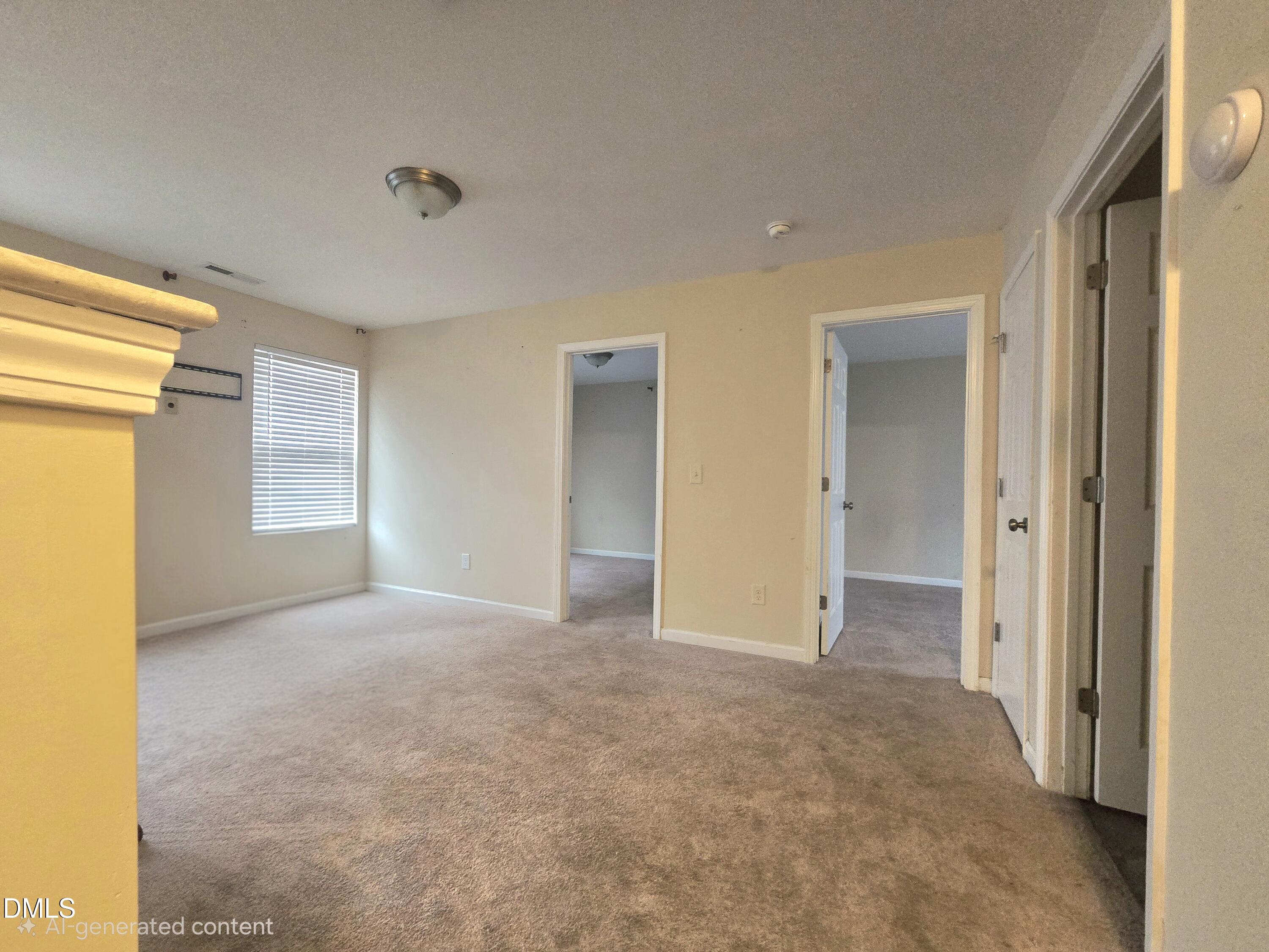 202 Mason Road Durham, NC 27712 - Photo 6 of 15 a view of an empty room and a window
