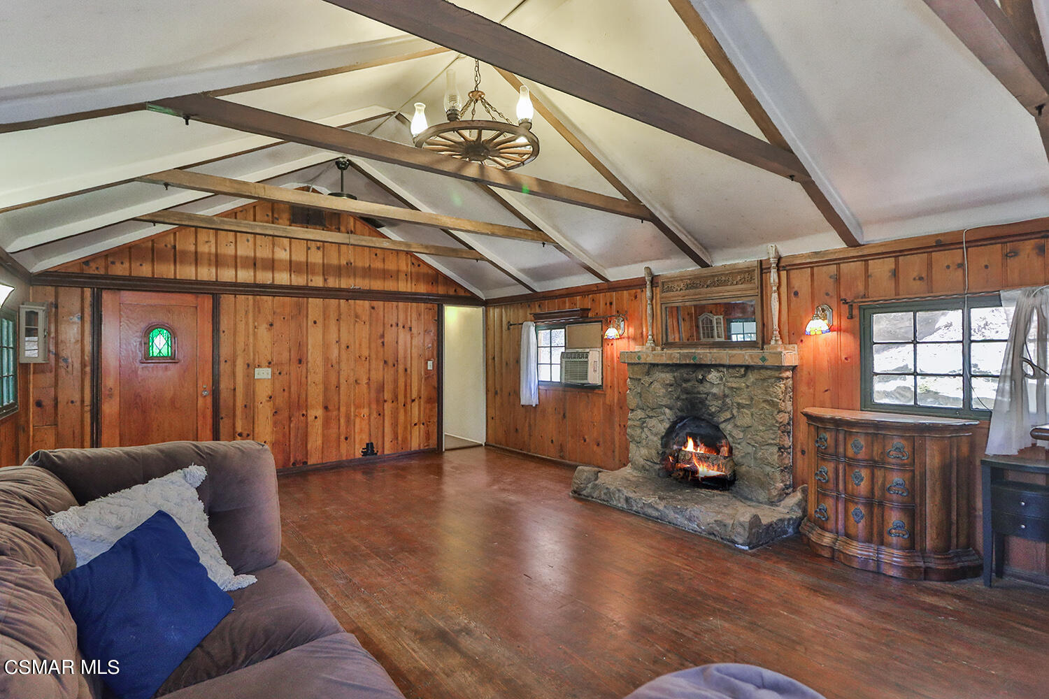 6456 Clear Springs Road Simi Valley, CA 93063 - Photo 15 of 56 a living room with furniture and a fireplace