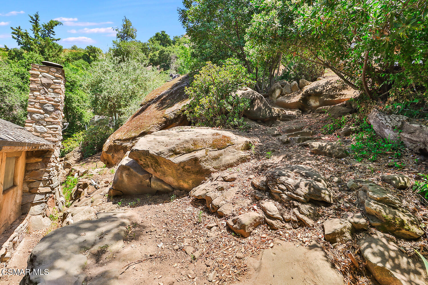 6456 Clear Springs Road Simi Valley, CA 93063 - Photo 35 of 56 a view of a wooden floor with a tree