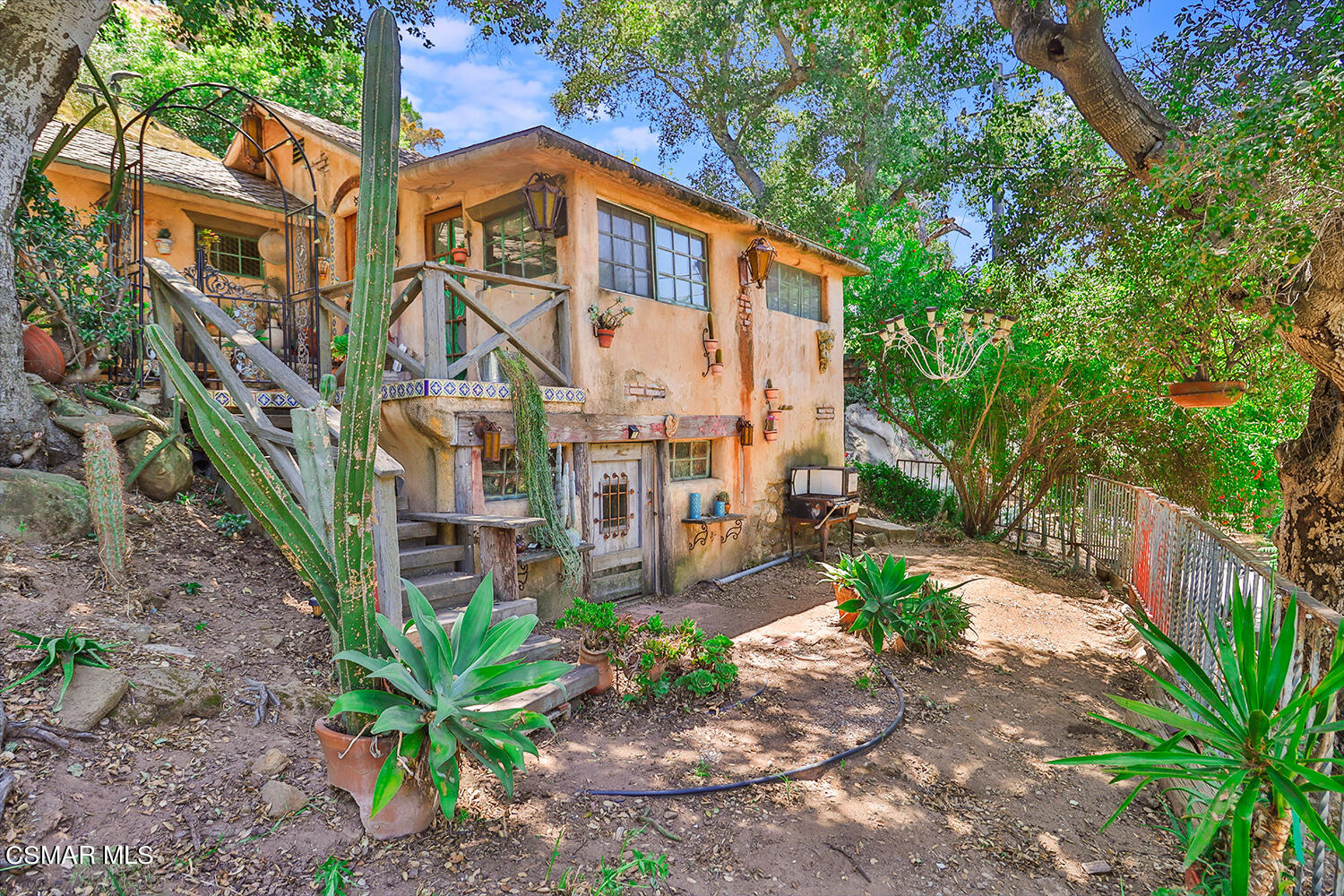 6456 Clear Springs Road Simi Valley, CA 93063 - Photo 43 of 56 a front view of a house with garden