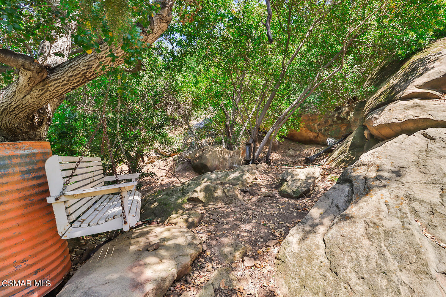 6456 Clear Springs Road Simi Valley, CA 93063 - Photo 52 of 56 a view of a backyard with chairs
