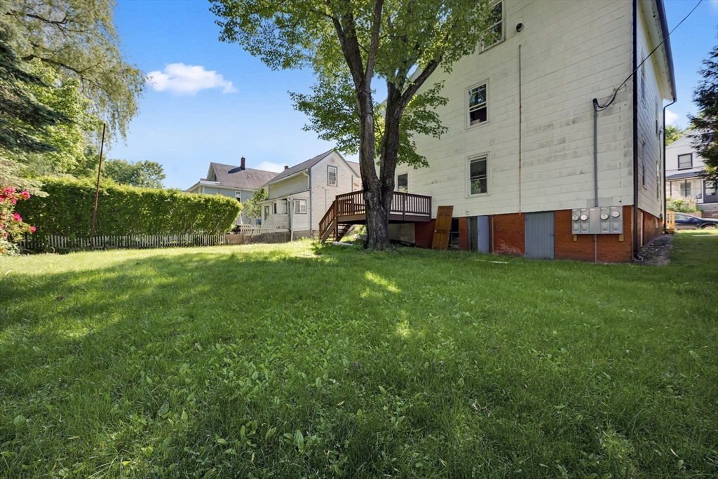 47 Morris Street Southbridge, MA 01550 - Photo 29 of 40 a view of a house with a backyard