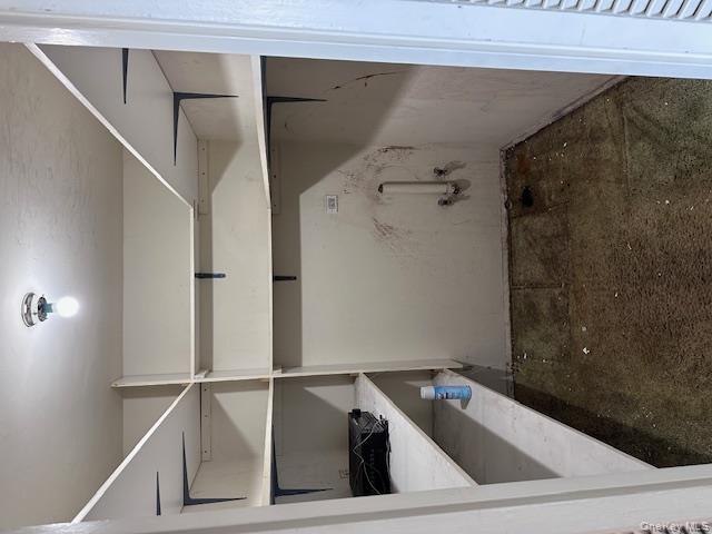 125-10 Queens Boulevard, Unit 2307 Queens, NY 11415 - Photo 12 of 25 a room with cabinets